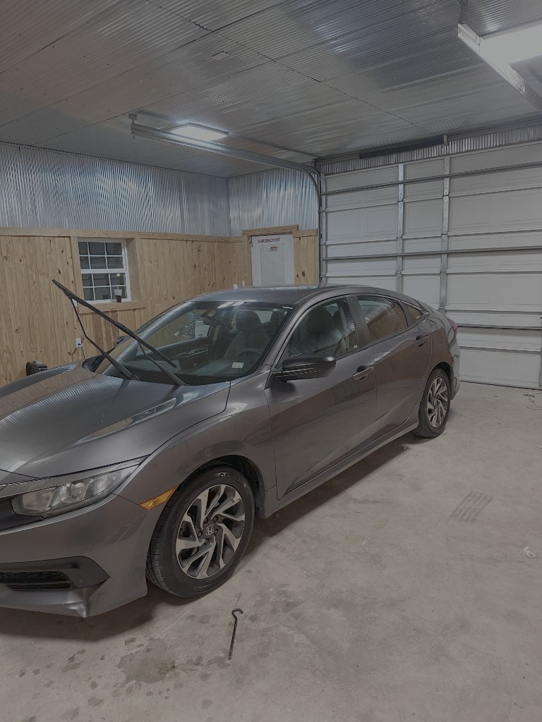 Gray sedan after exterior detailing